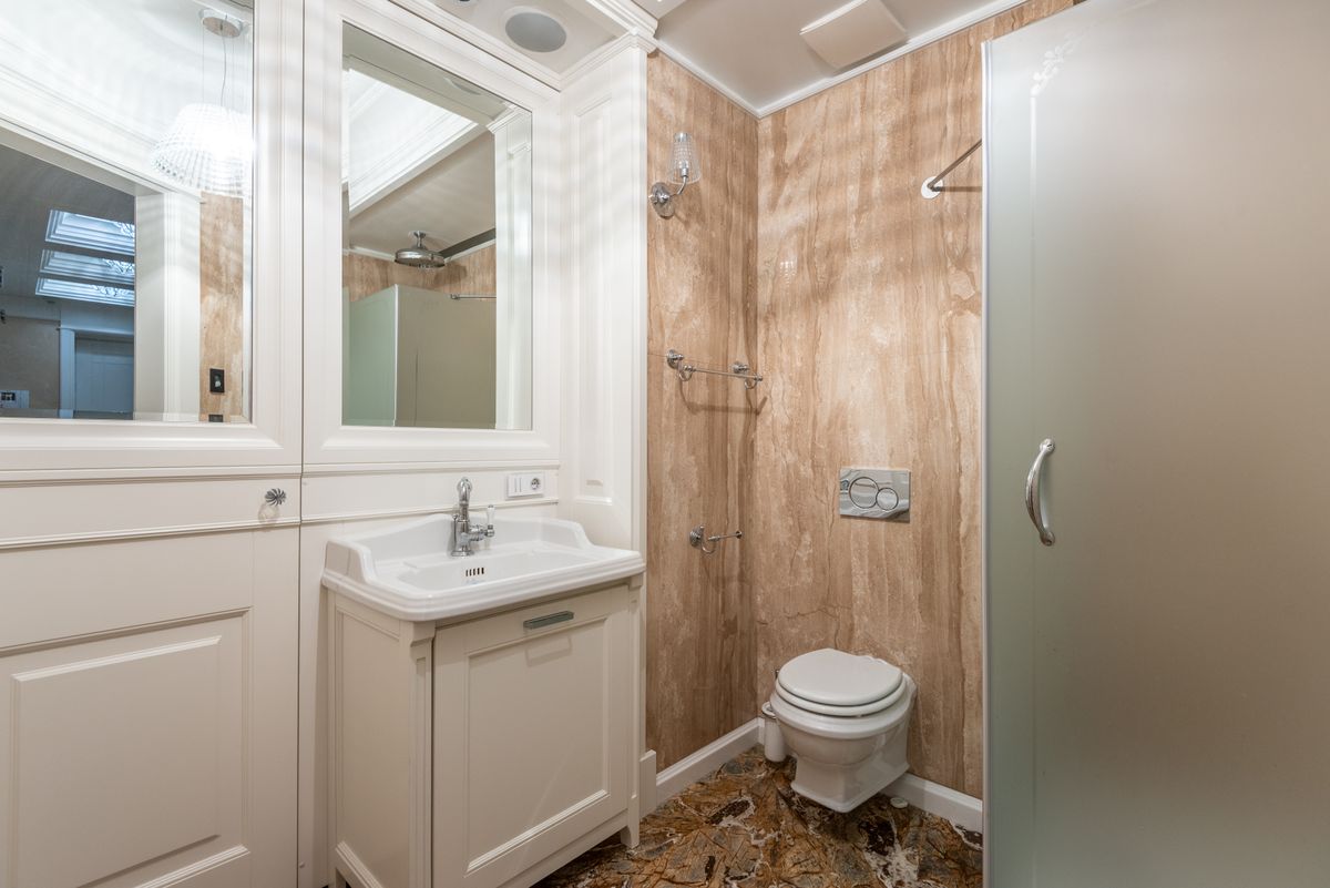Toilet in a classic-style Dallas, TX bathroom needing a new wax ring seal
